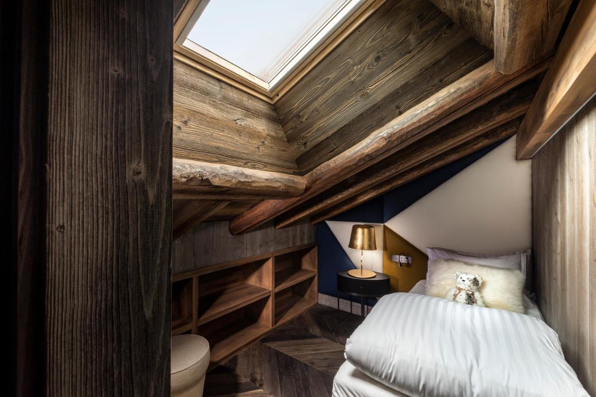 Un ou plusieurs lits dans un hébergement de l'établissement Armancette - The Leading Hotels of the World