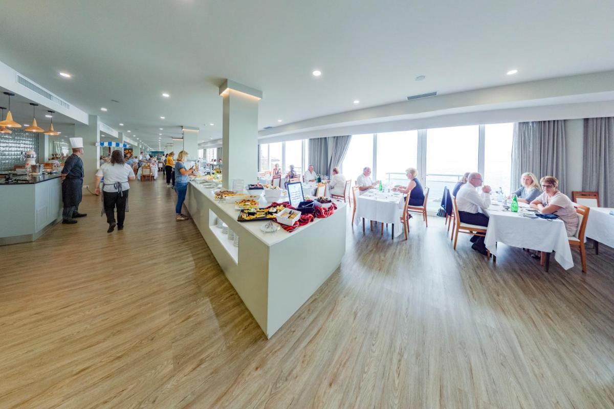 Os clientes hospedados em Hotel Orca Praia