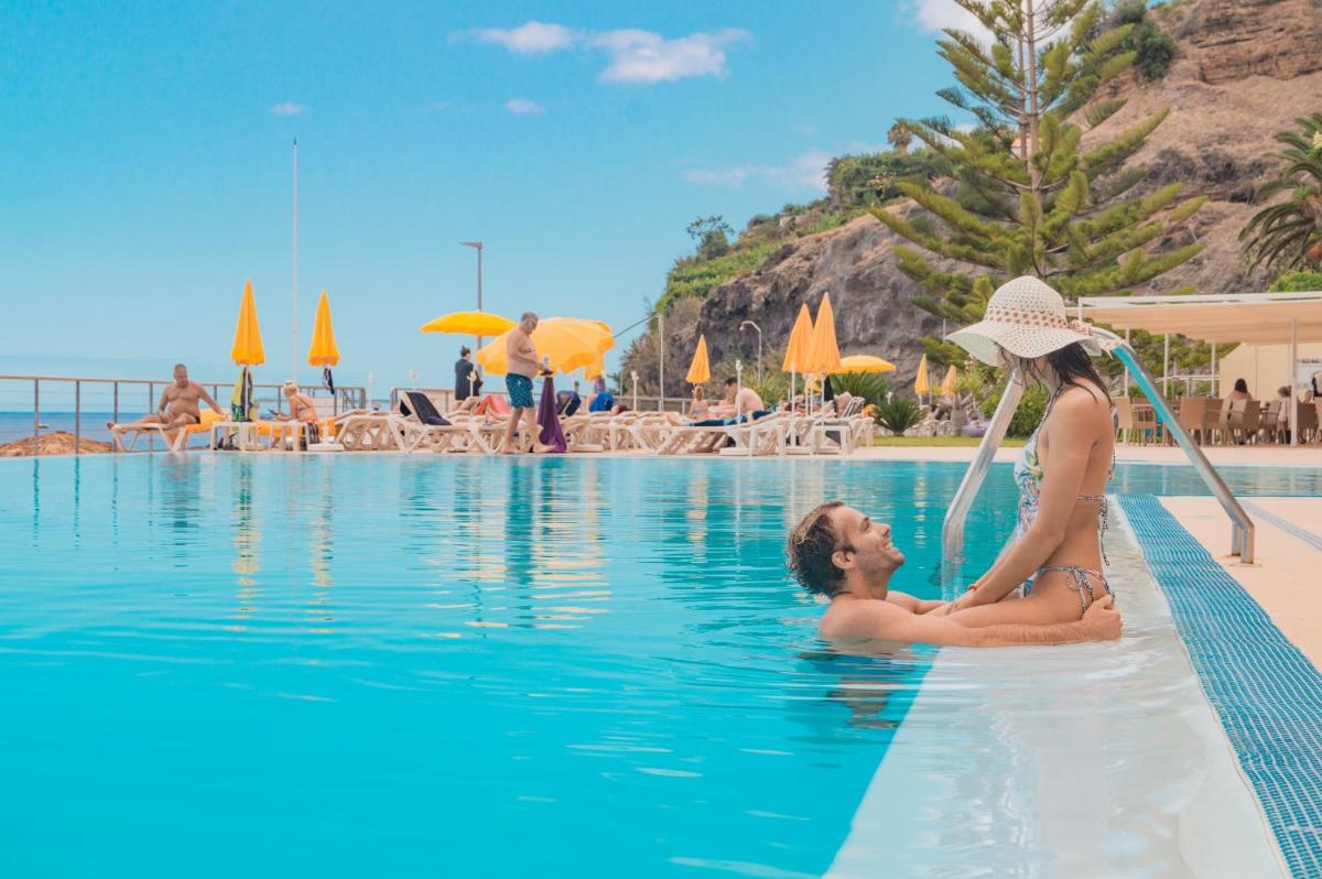 Os clientes hospedados em Hotel Orca Praia