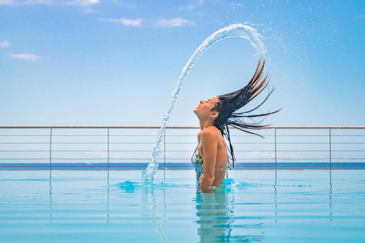 Os clientes hospedados em Hotel Orca Praia