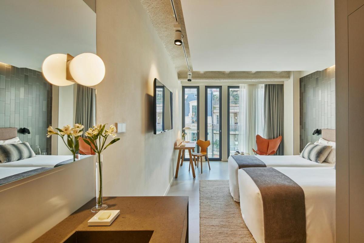 Cama o camas de una habitación en Ohla Eixample