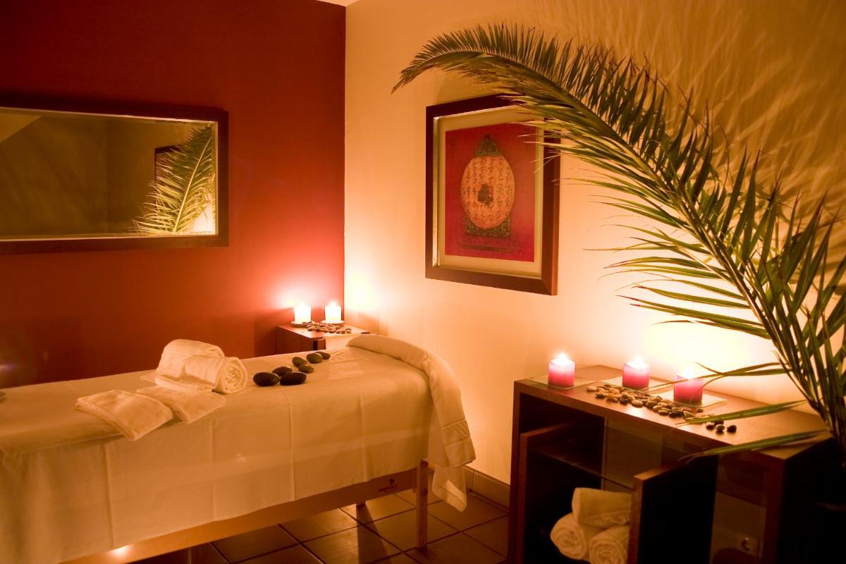 Uma cama ou camas num quarto em Cerro Mar Atlantico & Cerro Mar Garden