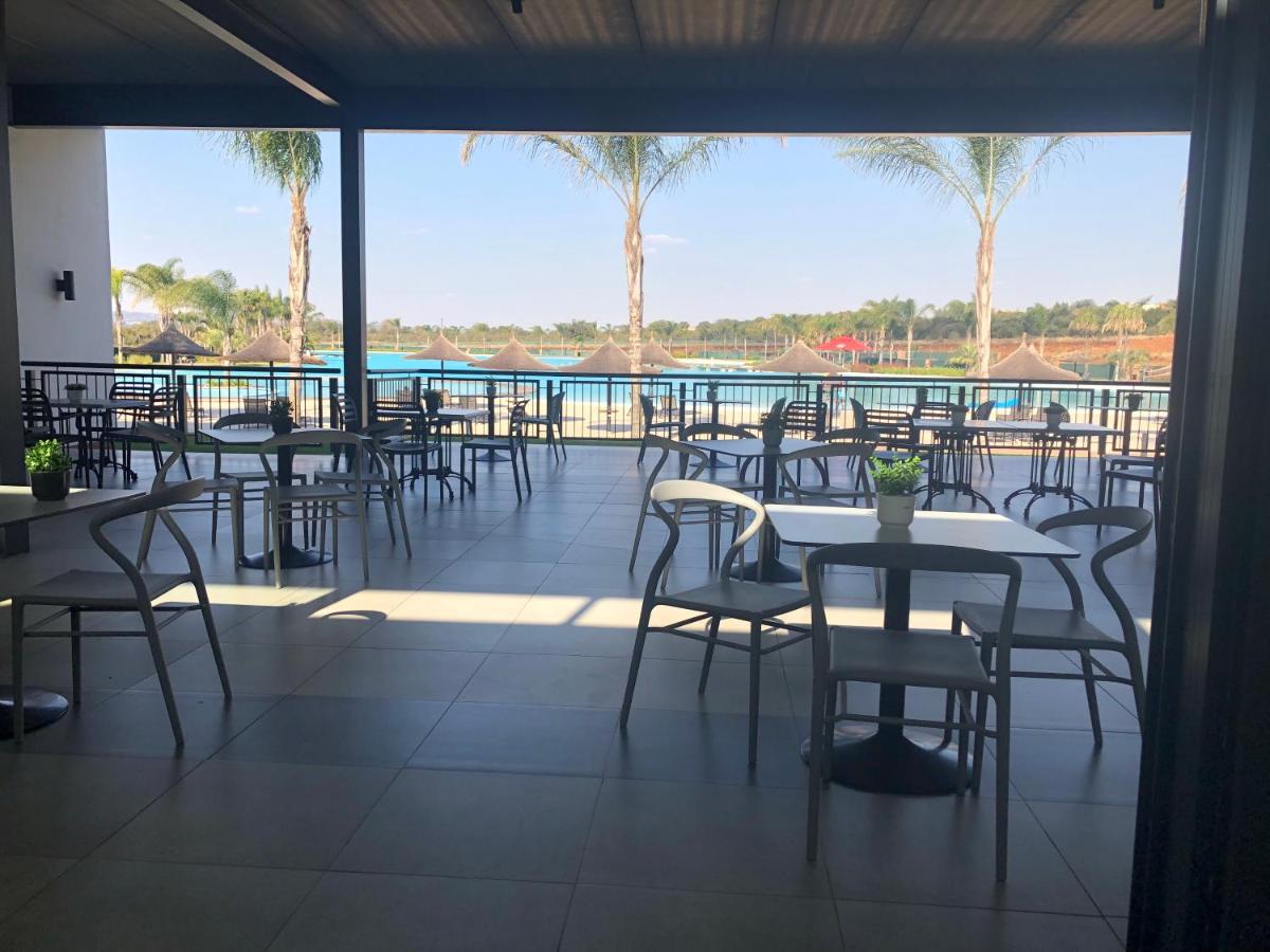 A Coastal/island experience at a Large 2 bed apartment at a Crystal Lagoon Estate. - Hizvo