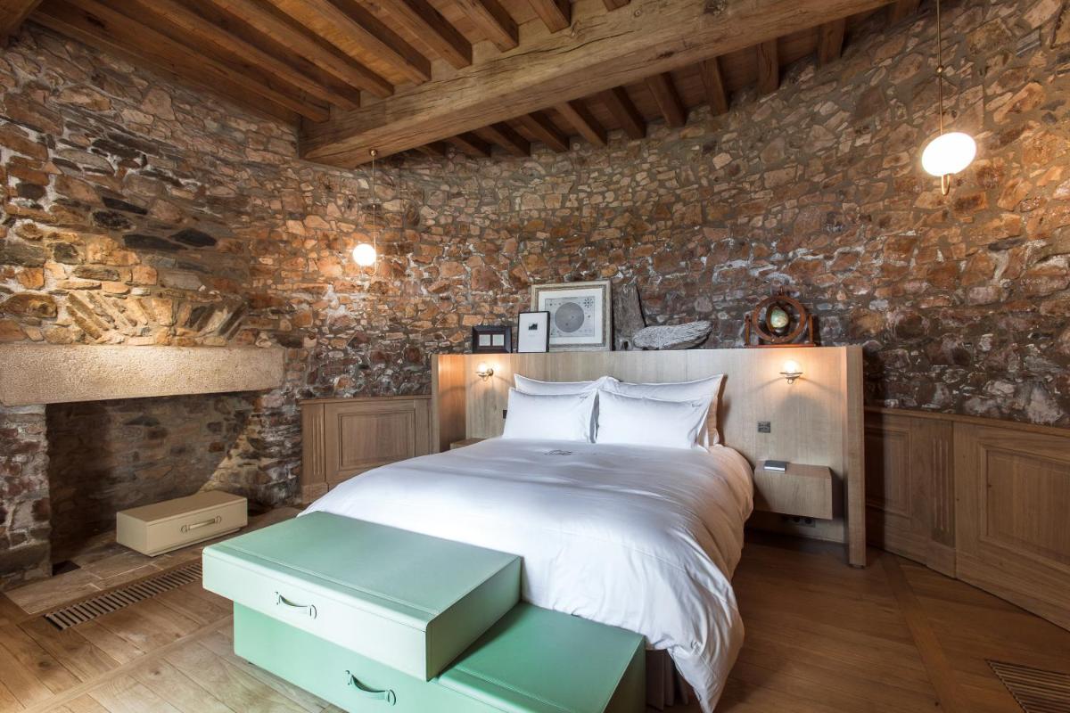 Un ou plusieurs lits dans un hébergement de l'établissement HOTEL Domaine des Etangs, Auberge Resorts Collection