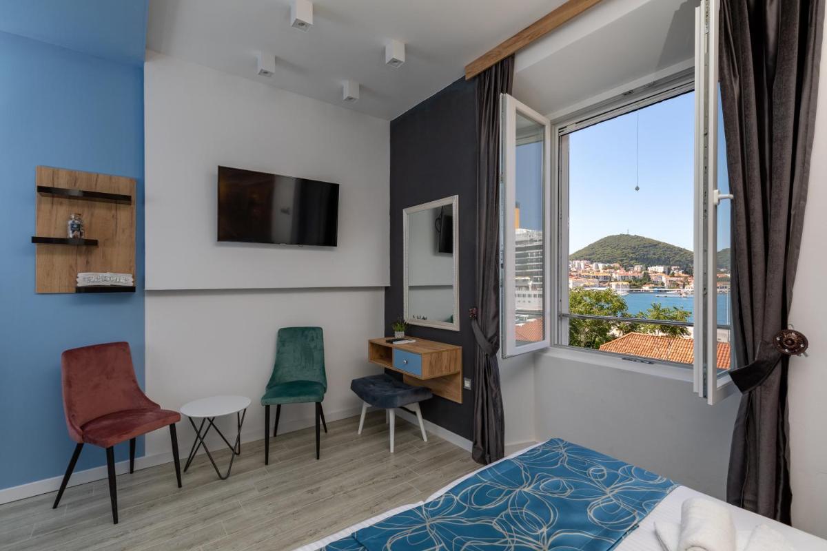 Apartments and Rooms Villa Naida - Housity