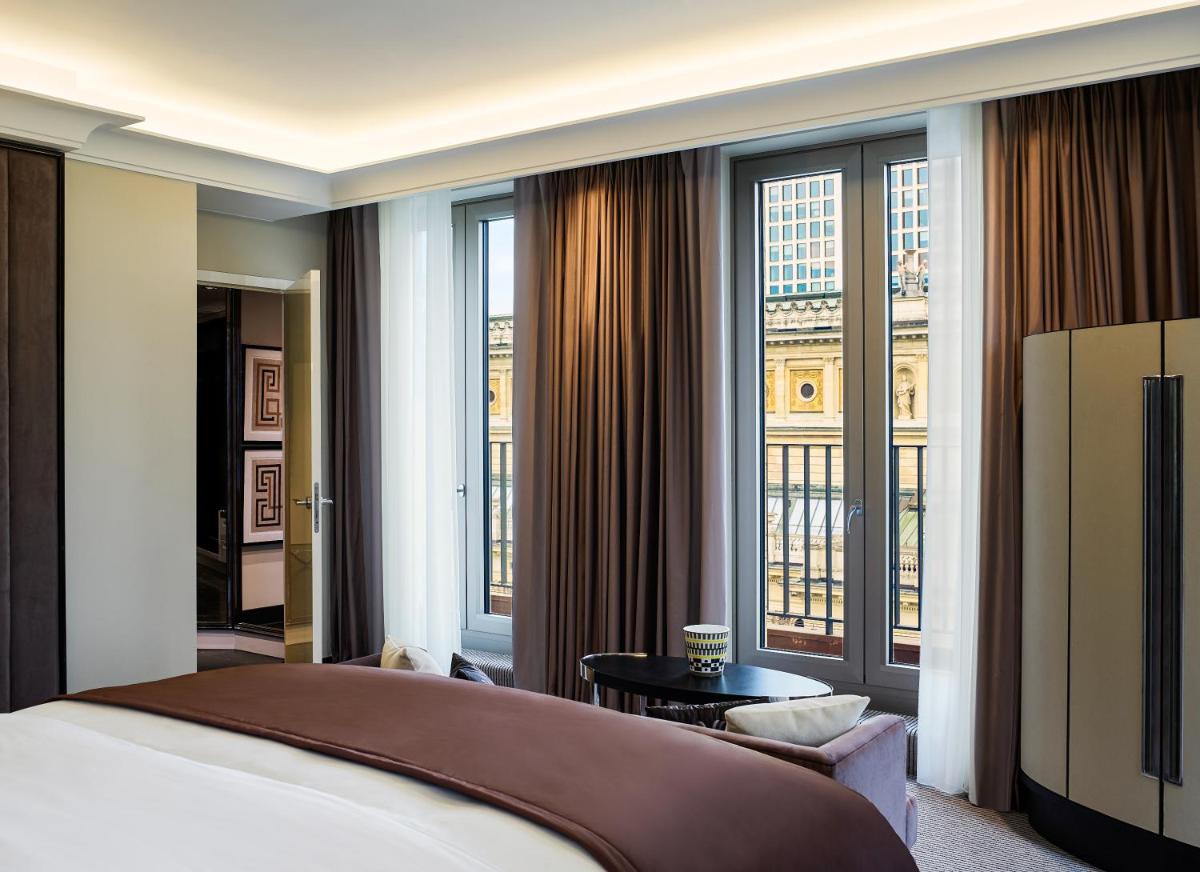 Ein Bett oder Betten in einem Zimmer der Unterkunft Sofitel Frankfurt Opera