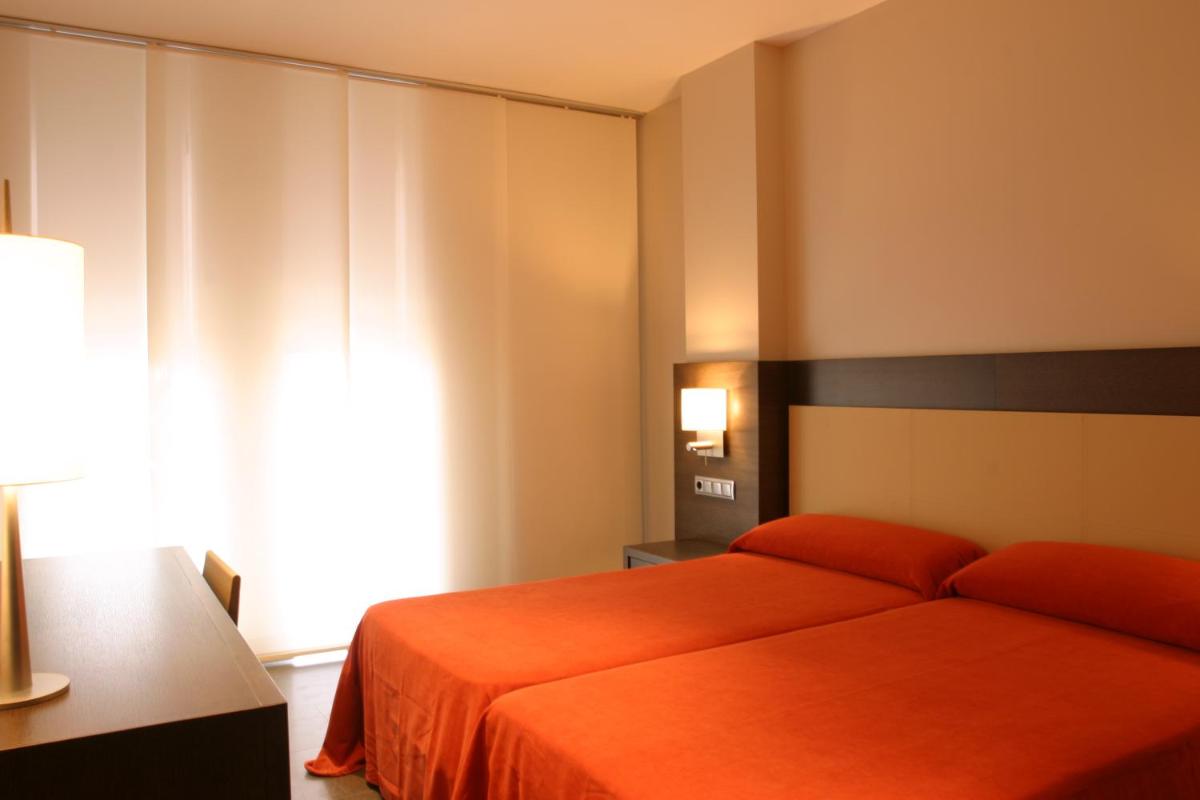 Cama o camas de una habitación en Hotel Hyltor