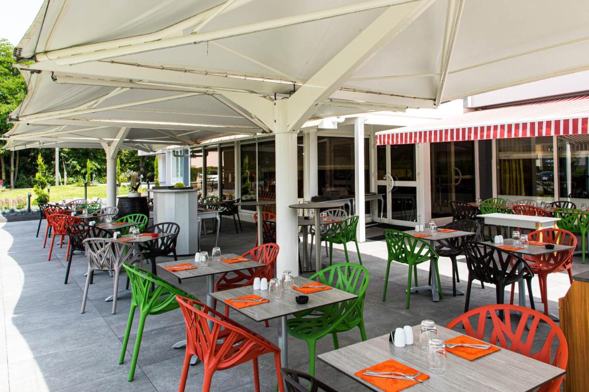 Restaurant ou autre lieu de restauration dans l'établissement Europe Haguenau – Hotel & Spa