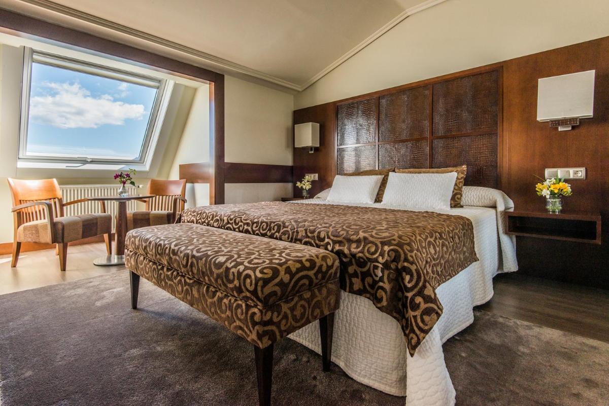Cama o camas de una habitación en Eurostars Louxo Talaso