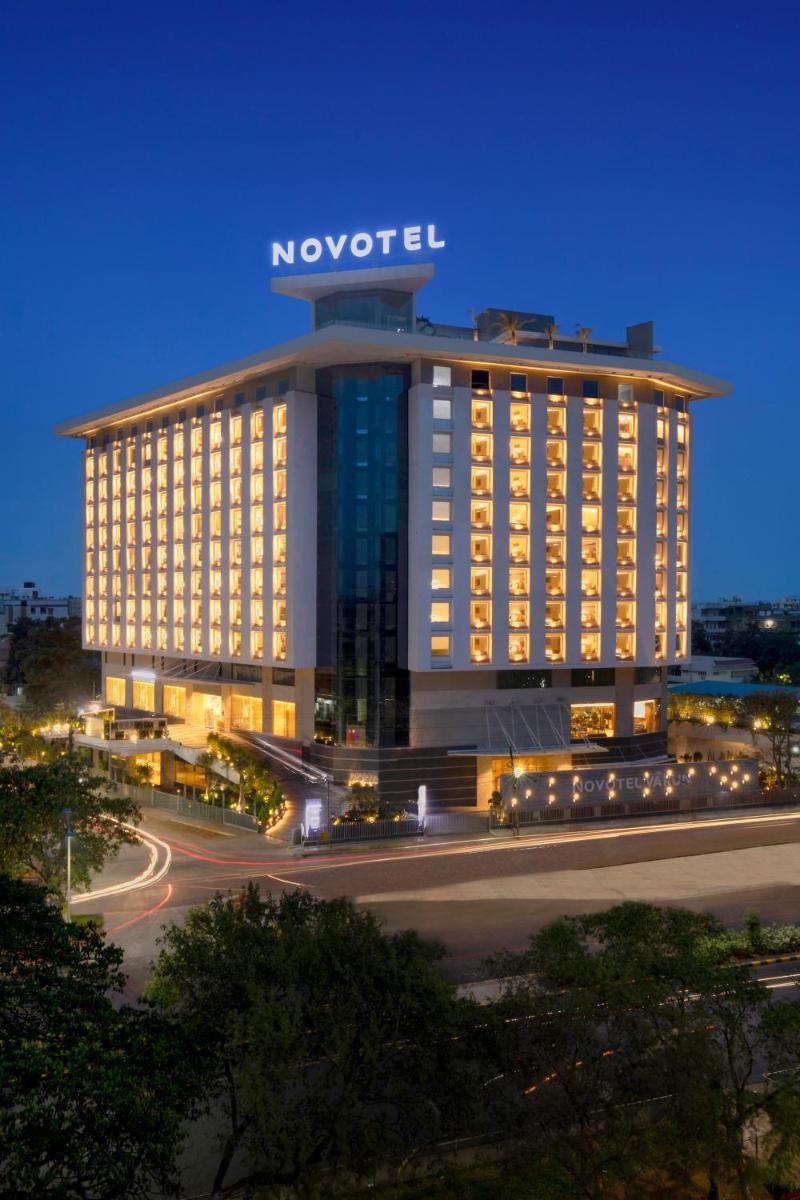 a hotel building with a novisor sign on top of it at Novotel Vijayawada Varun in Vijayawāda