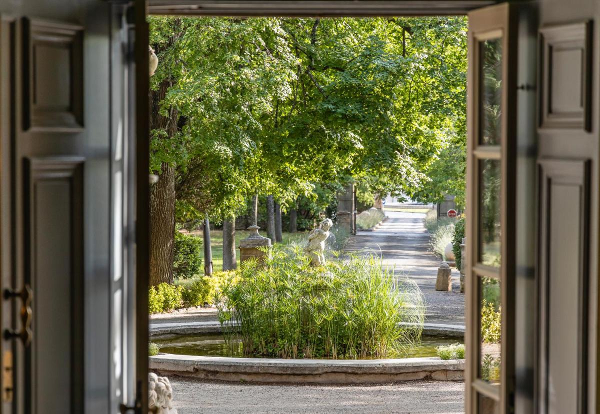 Jardin de l'établissement Hôtel - Restaurant & Spa La Magdeleine - Mathias Dandine