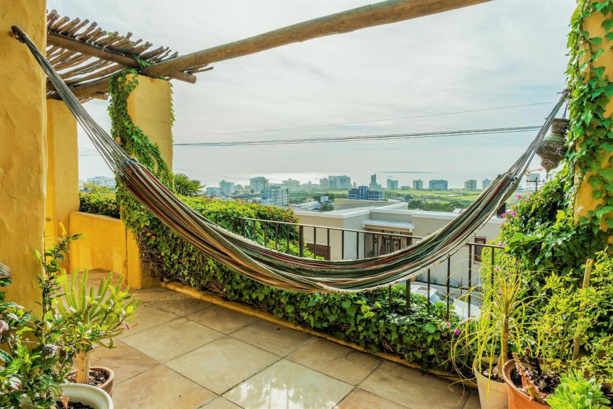 Sun, Sea & a Wood-Fired Hot Tub in a Downtown Mediterranean Villa - Housity