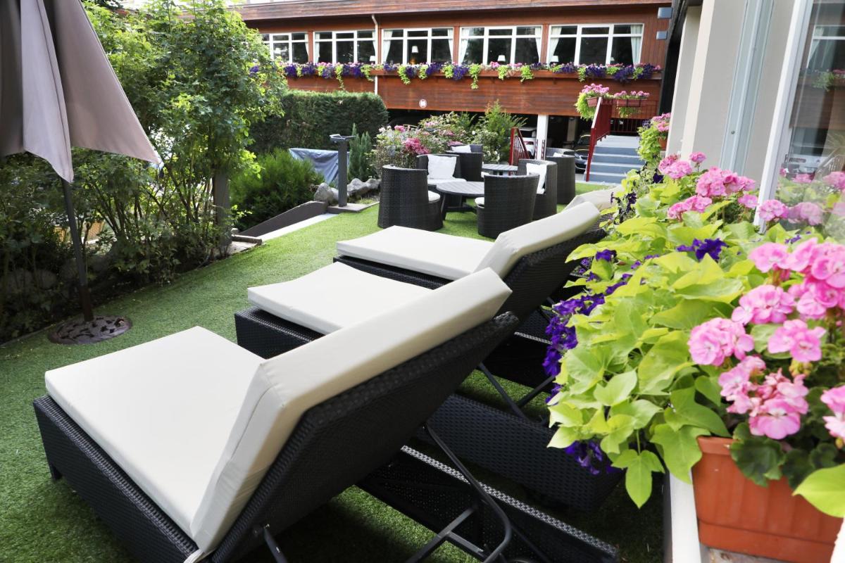 Jardin de l'établissement Hotel de la Jamagne & Spa