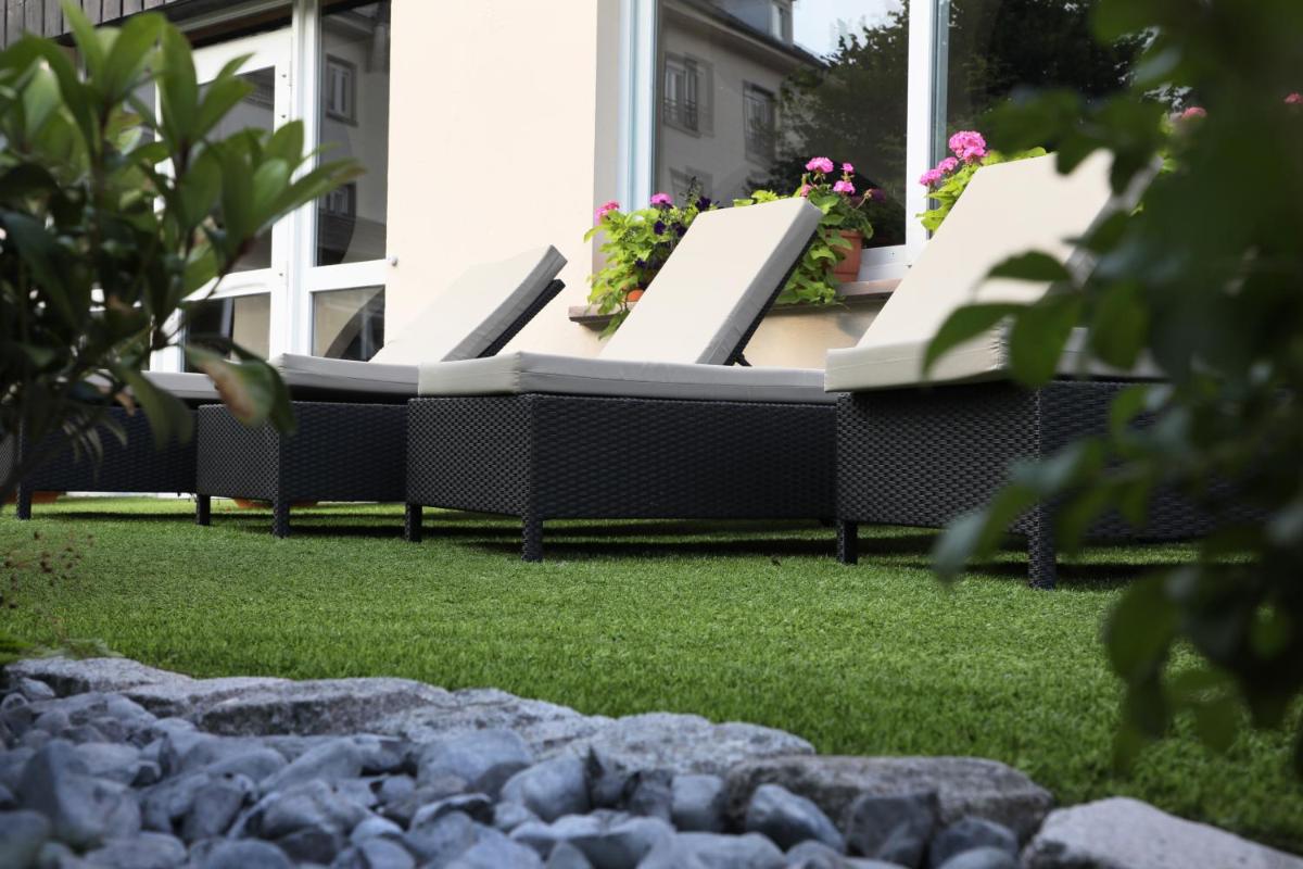 Jardin de l'établissement Hotel de la Jamagne & Spa
