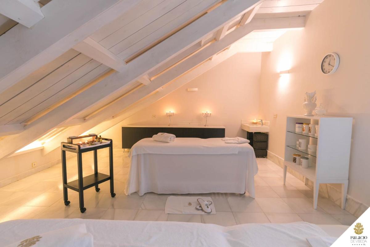 Cama o camas de una habitación en Hotel Palacio De Úbeda 5 G.L