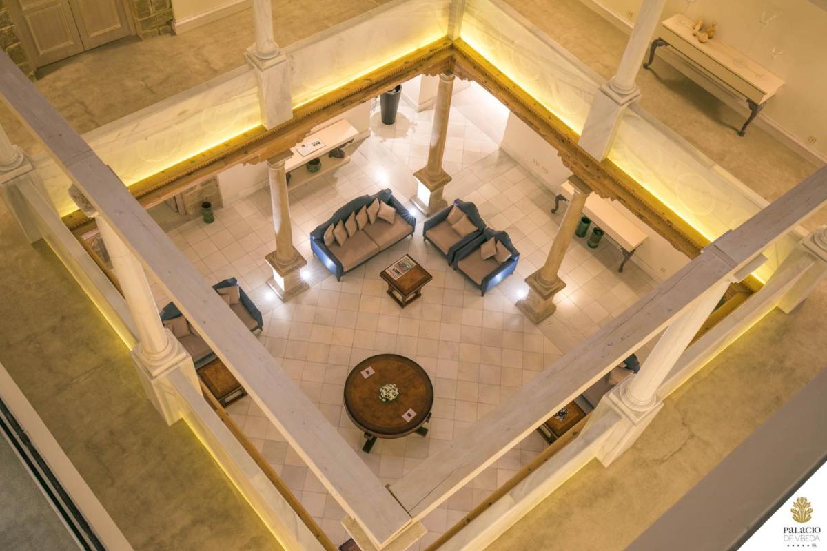 Zona de estar de Hotel Palacio De Úbeda 5 G.L