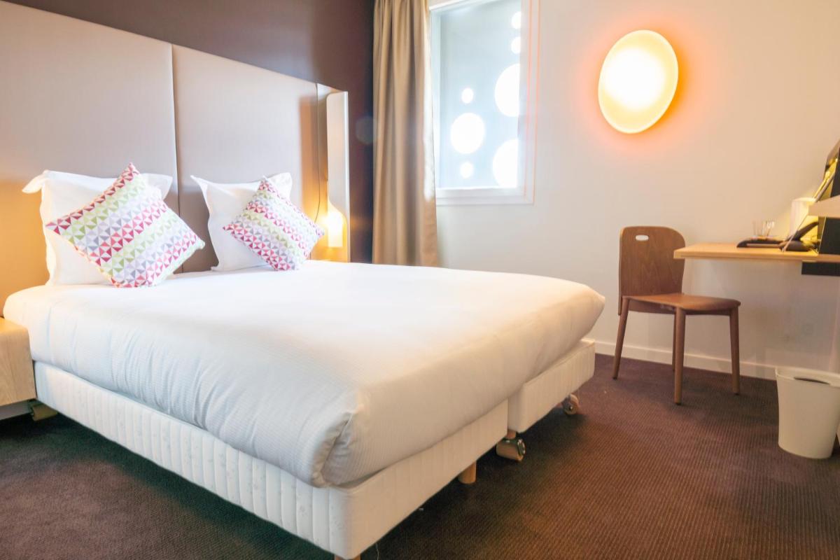 Un ou plusieurs lits dans un hébergement de l'établissement Hotel Campanile Montpellier Centre St Roch