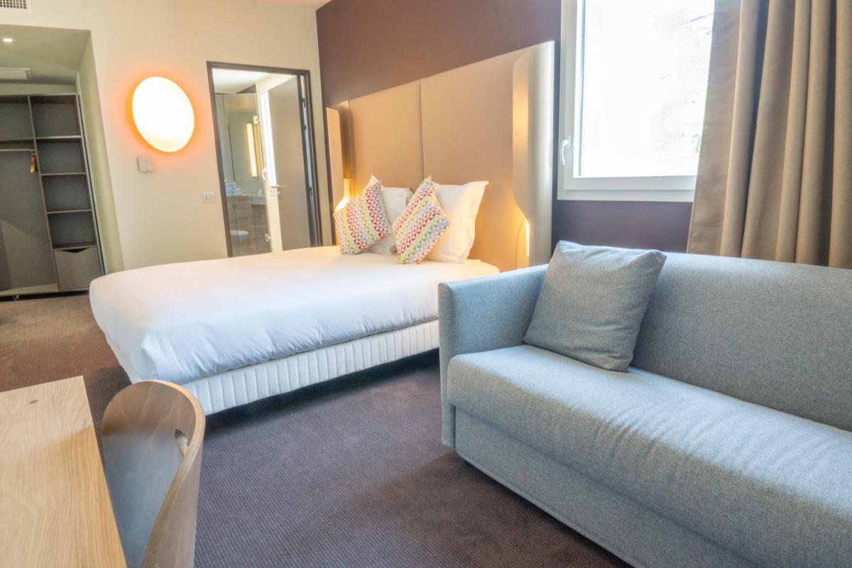 Un ou plusieurs lits dans un hébergement de l'établissement Hotel Campanile Montpellier Centre St Roch