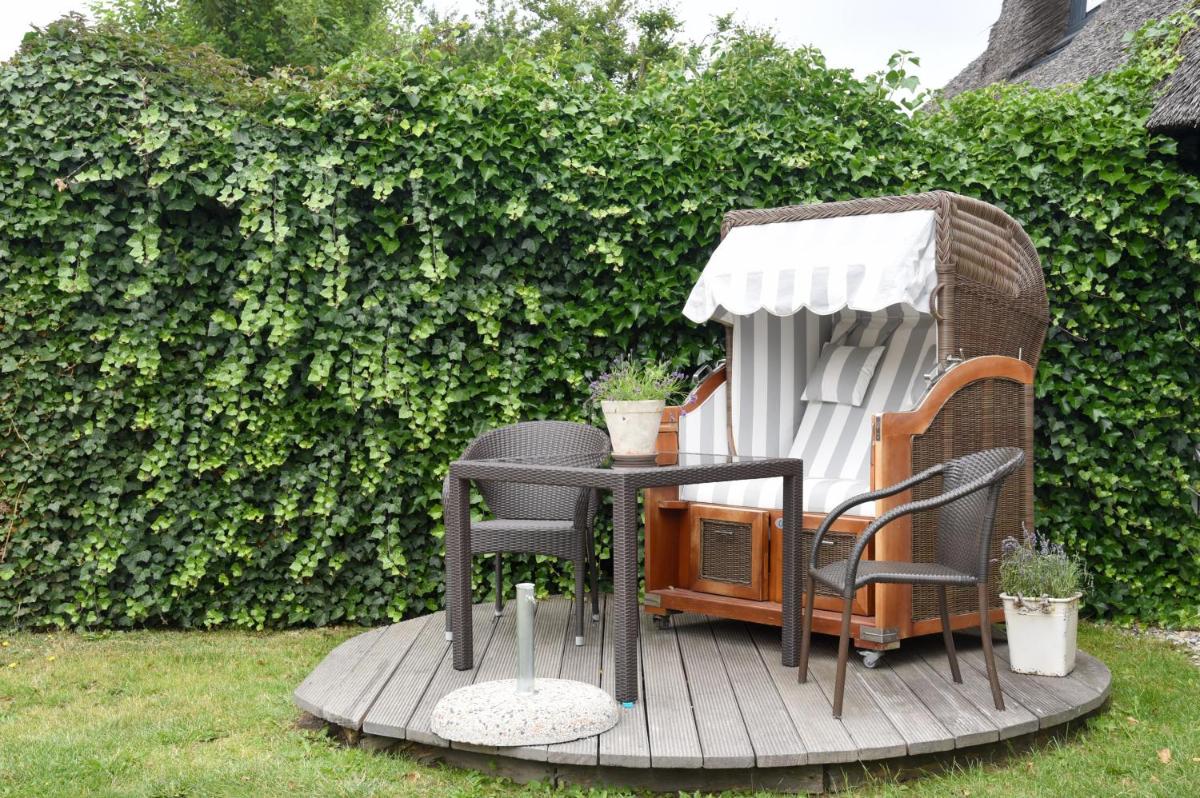 Ein Garten an der Unterkunft Relais & Châteaux Landhaus Stricker