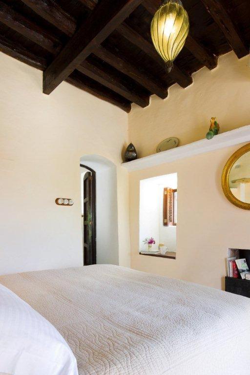Cama o camas de una habitación en Agroturismo Can Talaias San CArlos