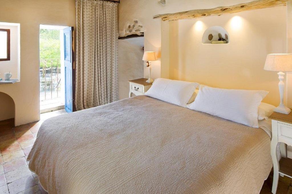 Cama o camas de una habitación en Agroturismo Can Talaias San CArlos