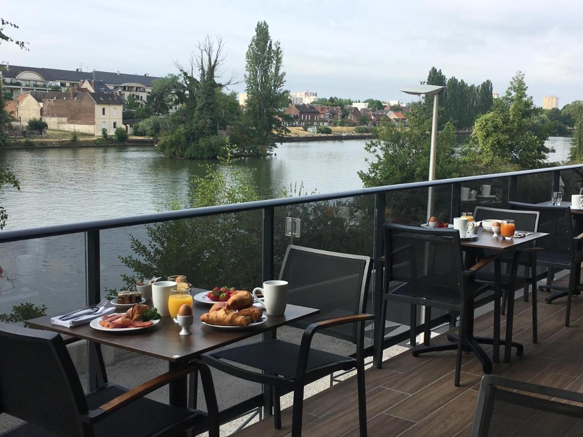 Vue sur la rivière ou le fleuve situé(e) à proximité de l'hôtel