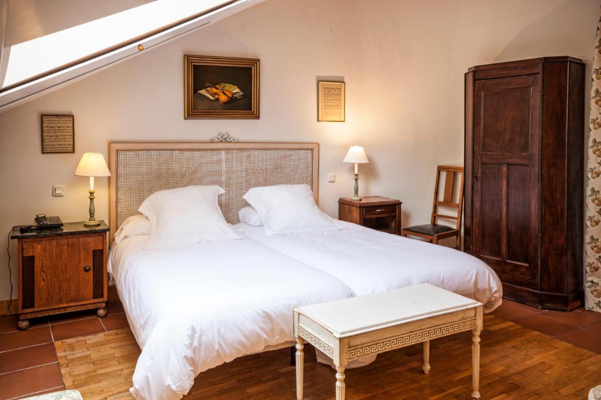 Cama o camas de una habitación en Hotel Spa Salinas de Imón