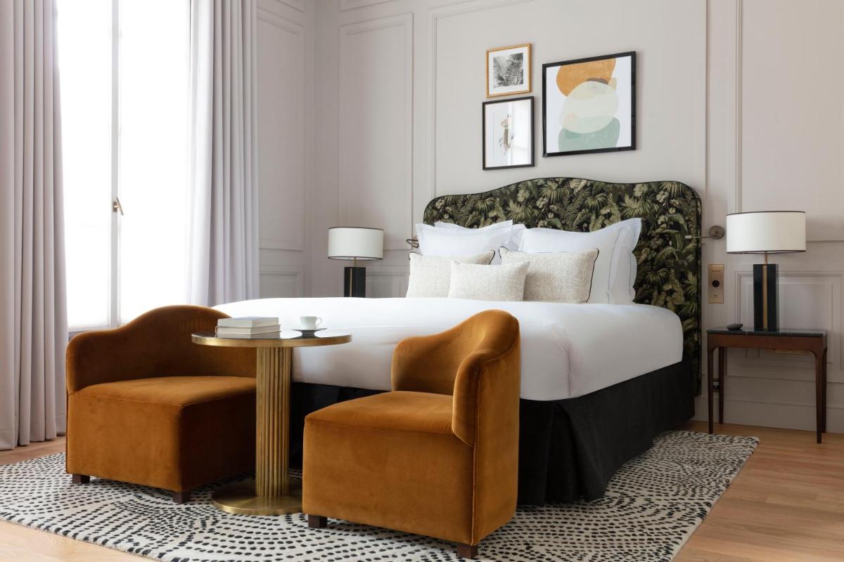 Un ou plusieurs lits dans un hébergement de l'établissement Les Jardins du Faubourg Hotel & Spa by Shiseido