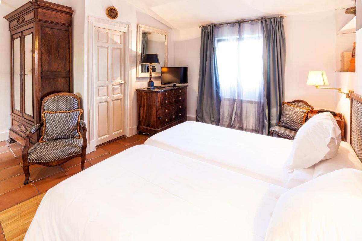 Cama o camas de una habitación en Hotel Spa Salinas de Imón