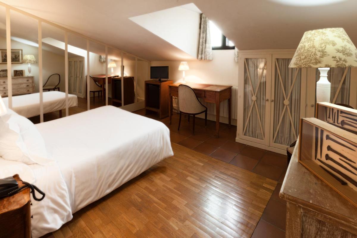 Cama o camas de una habitación en Hotel Spa Salinas de Imón