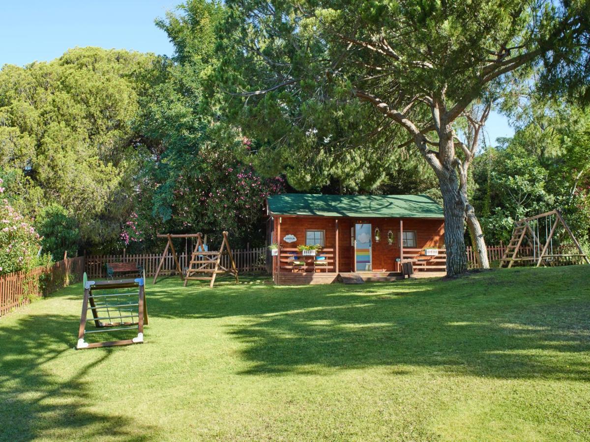 Um jardim no exterior de Hotel Quinta do Lago
