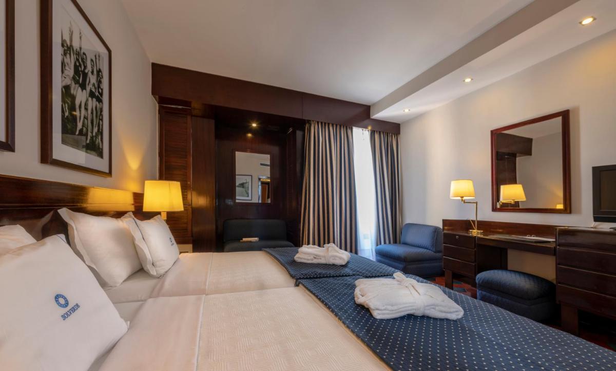Uma cama ou camas num quarto em Algarve Casino Hotel