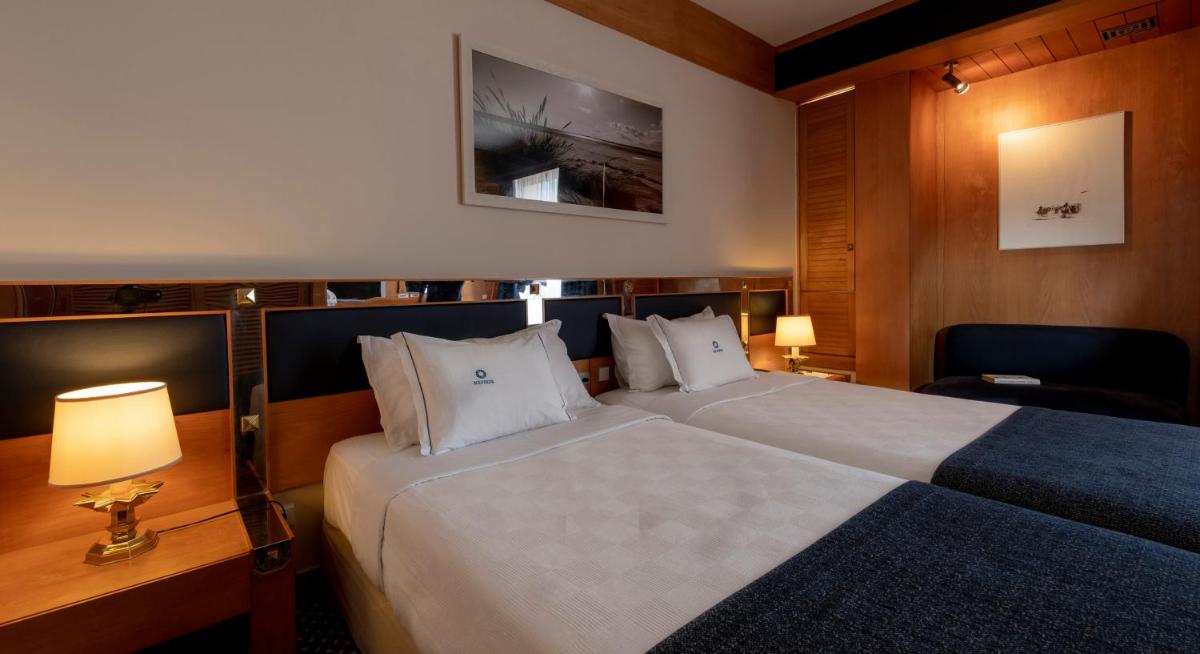Uma cama ou camas num quarto em Algarve Casino Hotel
