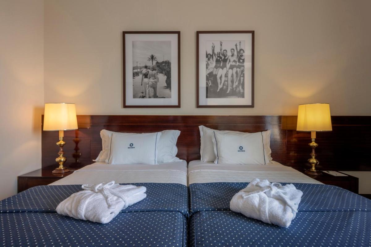 Uma cama ou camas num quarto em Algarve Casino Hotel
