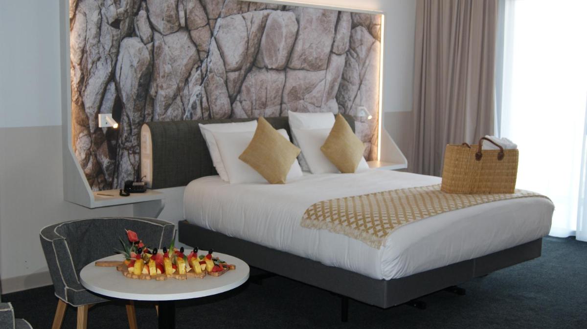 Un ou plusieurs lits dans un hébergement de l'établissement Mercure Hotel & Spa Bastia Biguglia