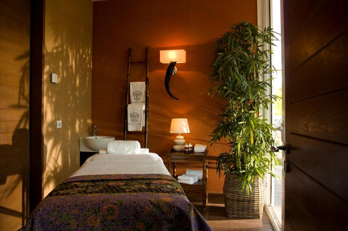 Cama o camas de una habitación en A Quinta Da Auga Hotel Spa Relais & Chateaux