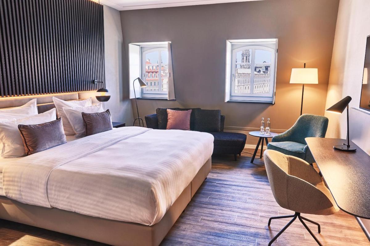 Ein Bett oder Betten in einem Zimmer der Unterkunft Steigenberger Hotel de Saxe Ein Bett oder Betten in einem Zimmer der Unterkunft Steigenberger Hotel de Saxe