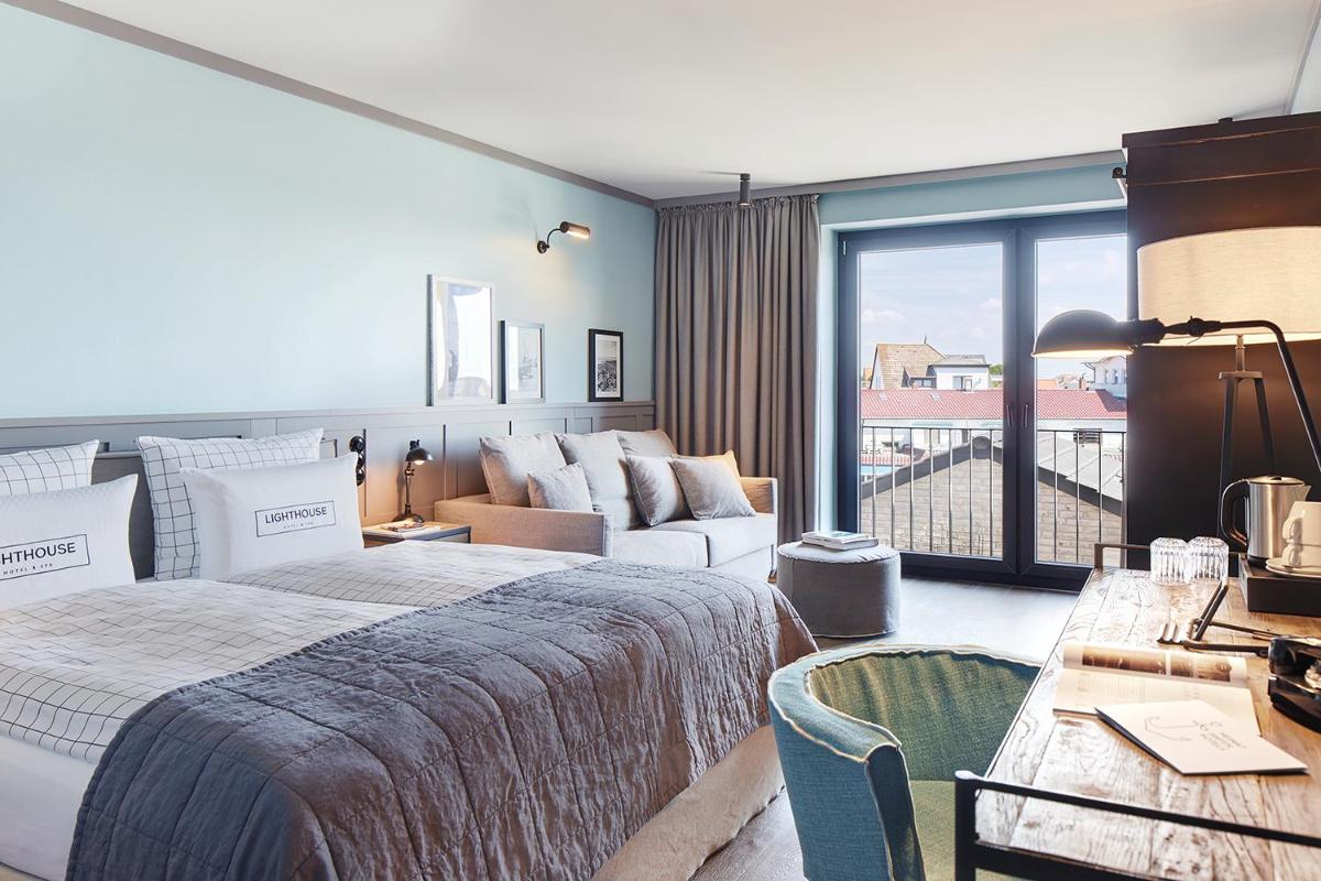 Ein Bett oder Betten in einem Zimmer der Unterkunft Lighthouse Hotel & Spa