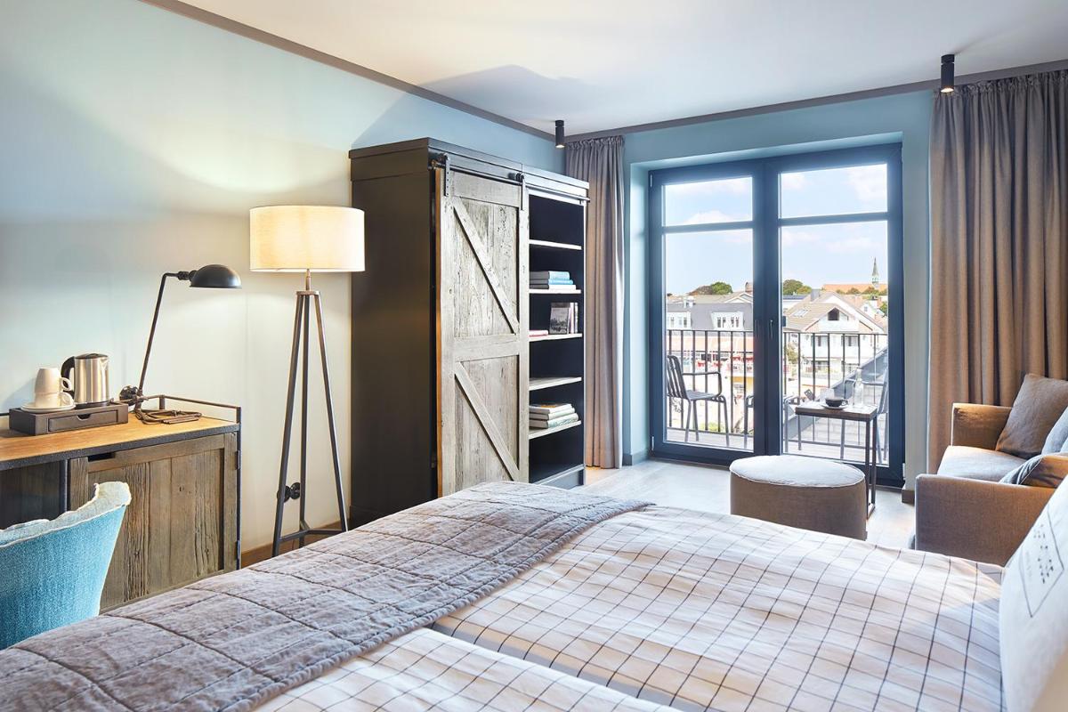 Ein Bett oder Betten in einem Zimmer der Unterkunft Lighthouse Hotel & Spa