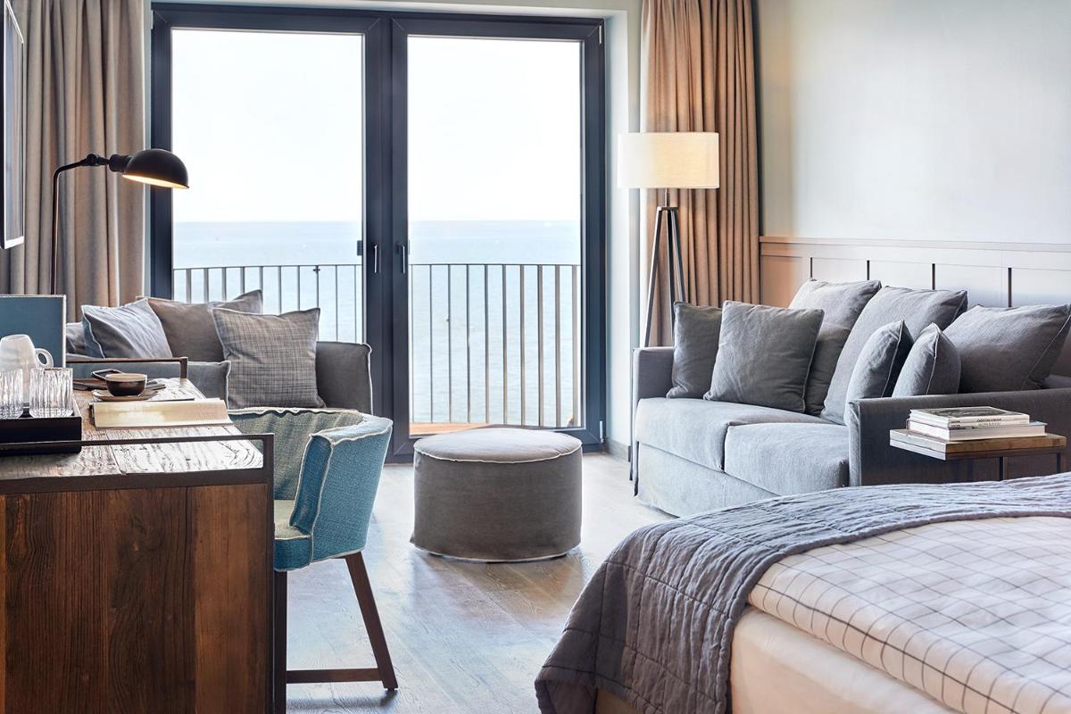 Ein Bett oder Betten in einem Zimmer der Unterkunft Lighthouse Hotel & Spa