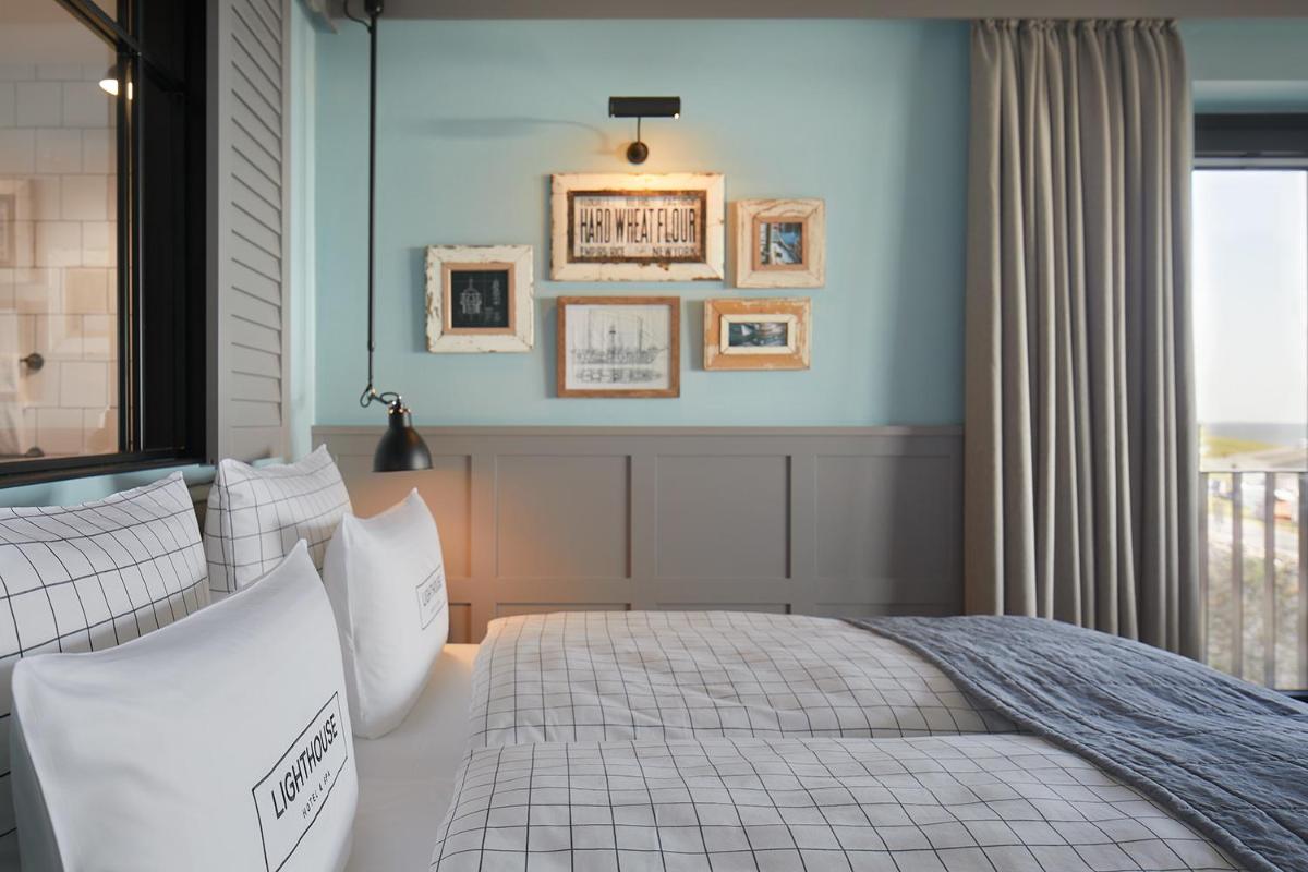 Ein Bett oder Betten in einem Zimmer der Unterkunft Lighthouse Hotel & Spa
