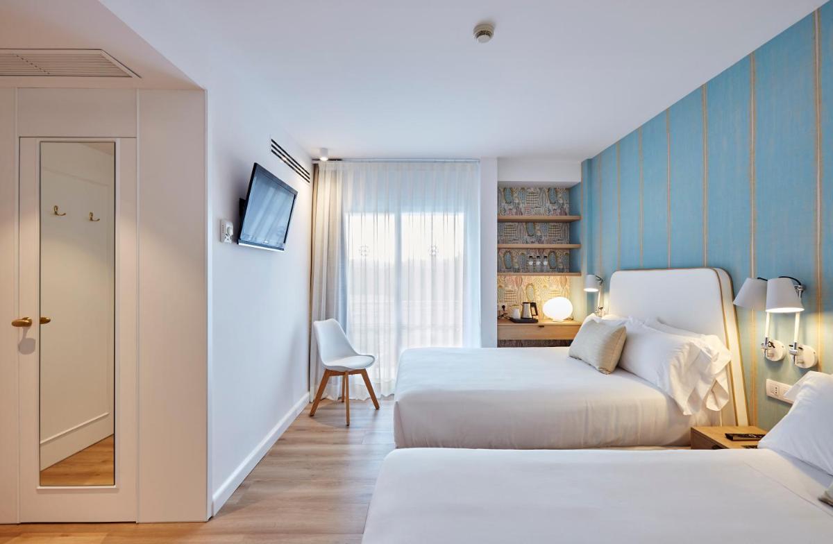 Cama o camas de una habitación en Hotel Anabel