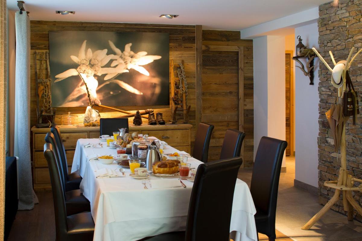 Restaurant ou autre lieu de restauration dans l'établissement Chalet-Hôtel Hermitage