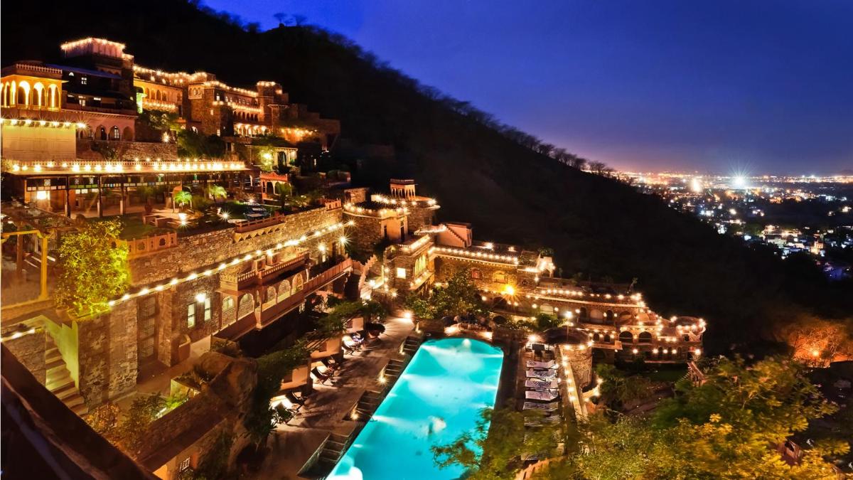 a view of a city at night at Neemrana Fort-Palace in Neemrana