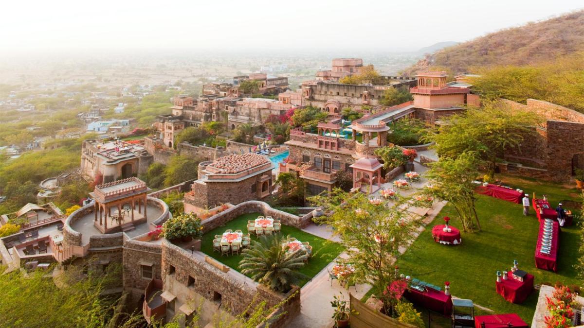 an aerial view of a village with buildings at Neemrana Fort-Palace in Neemrana