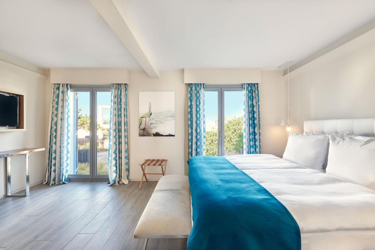 Cama o camas de una habitación en 7Pines Resort Ibiza, part of Destination by Hyatt
