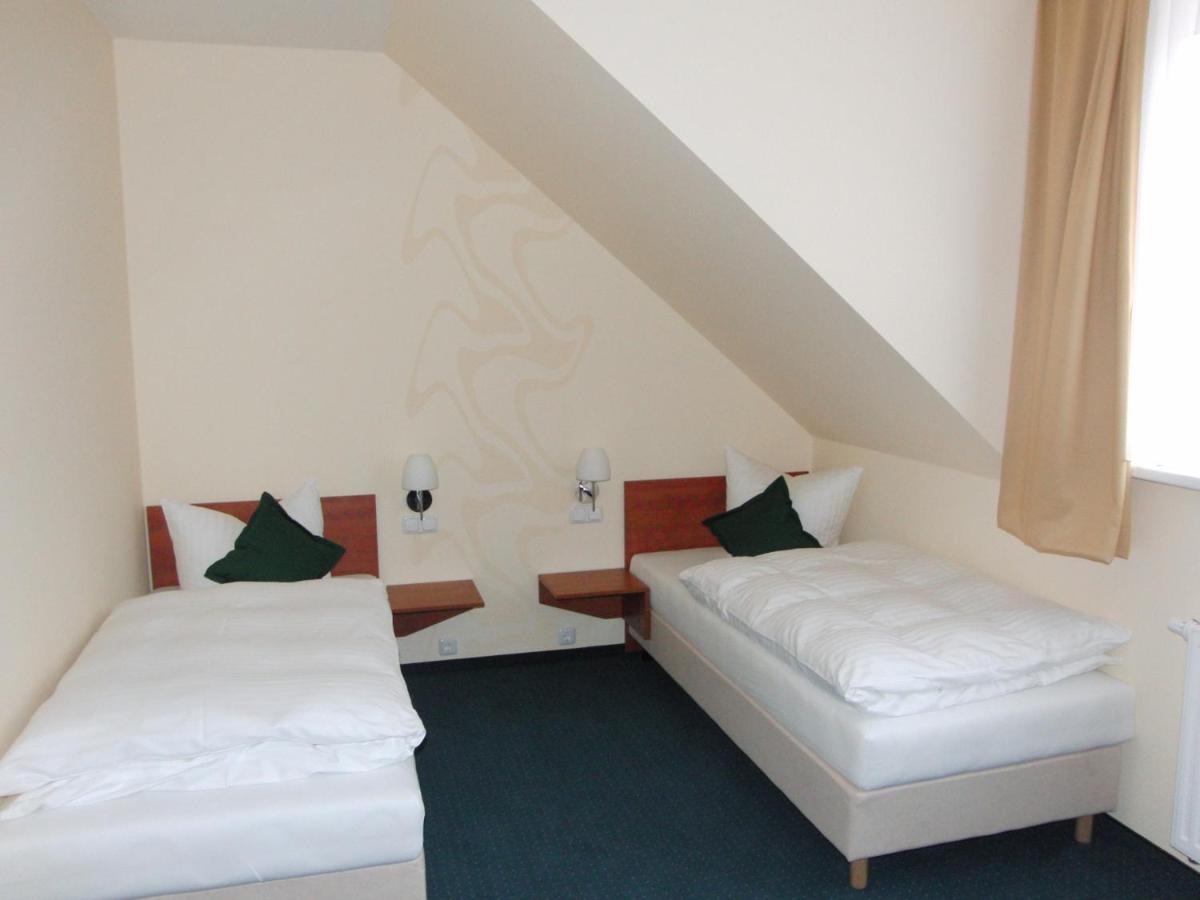 Hotel Garni Am Kirchplatz - Housity