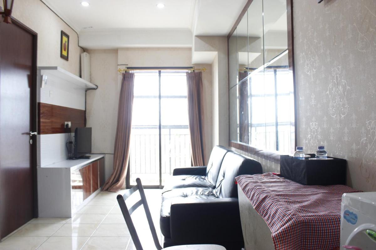 Cozy 2BR Tamansari Panoramic Apartment By Travelio - Housity
