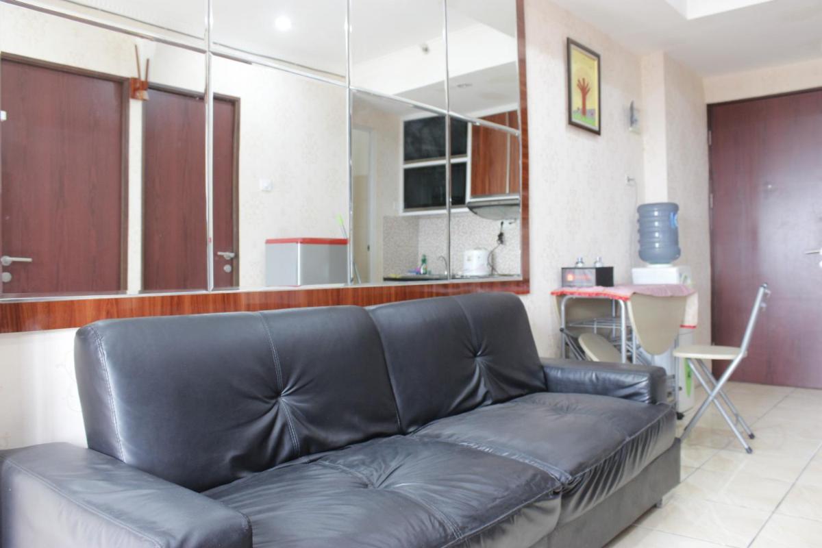 Cozy 2BR Tamansari Panoramic Apartment By Travelio - Housity