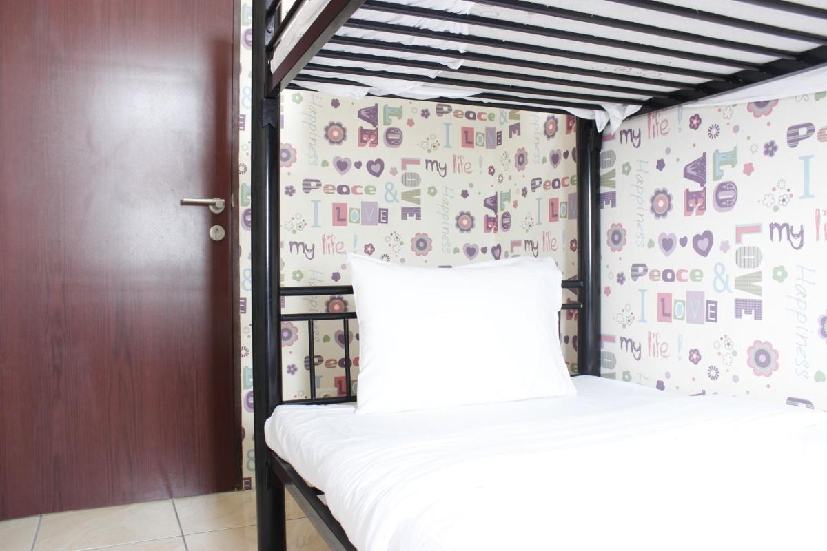 Cozy 2BR Tamansari Panoramic Apartment By Travelio - Housity